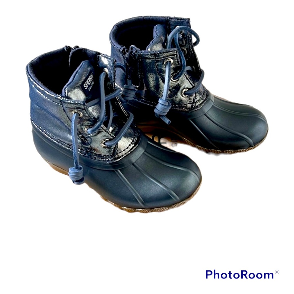 Brand new. Never worn. Sperry saltwater boot in metallic blue.